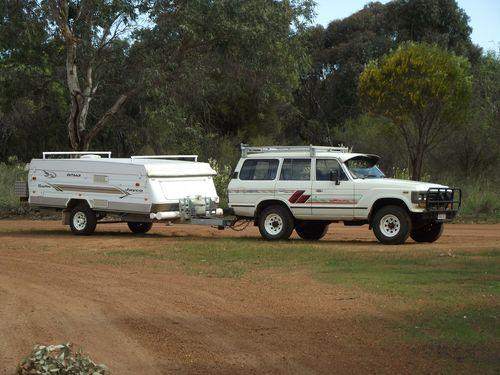 Jayco Swan Outback towed by a Toyota HJ60